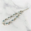 Sterling Silver Bracelet with Faceted Blue Topaz and Carved Link-Jewelry-Apiaria
