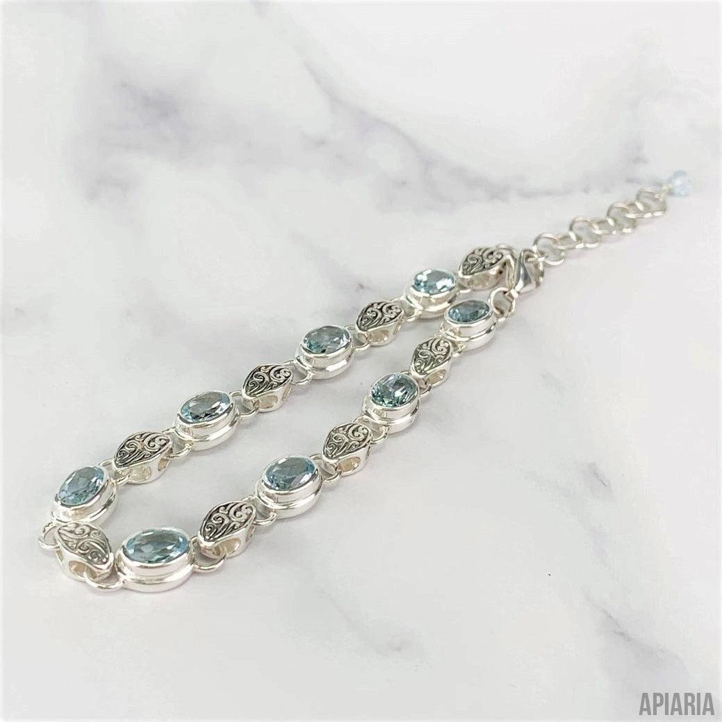 Sterling Silver Bracelet with Faceted Blue Topaz and Carved Link-Jewelry-Apiaria